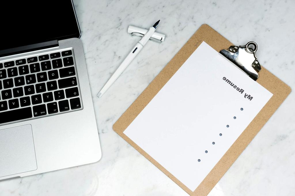 Variety of professional resume templates displayed on computer screens